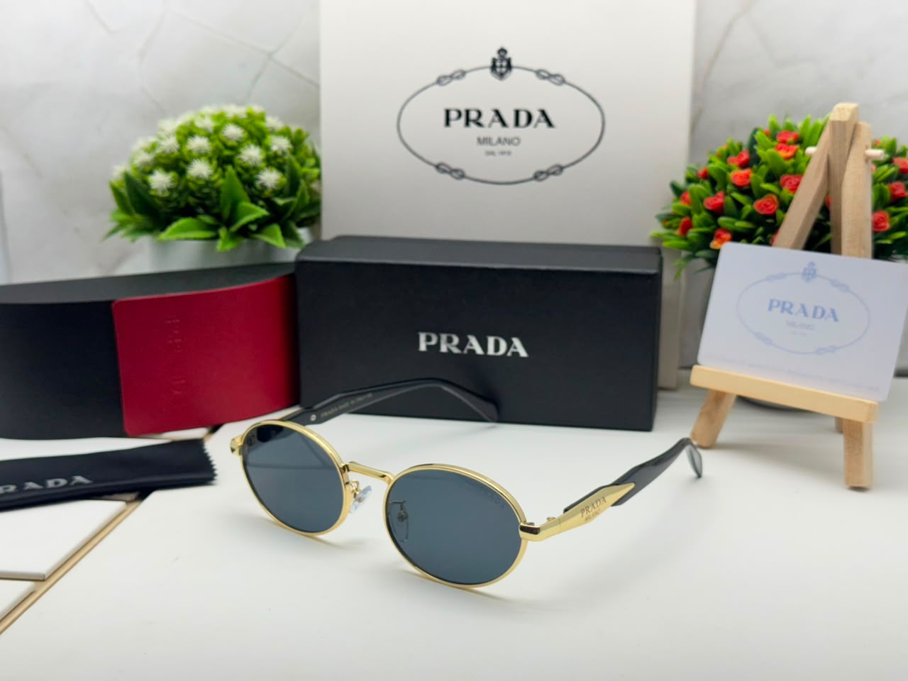 PRADA PR 65ZS GOLD BLACK
